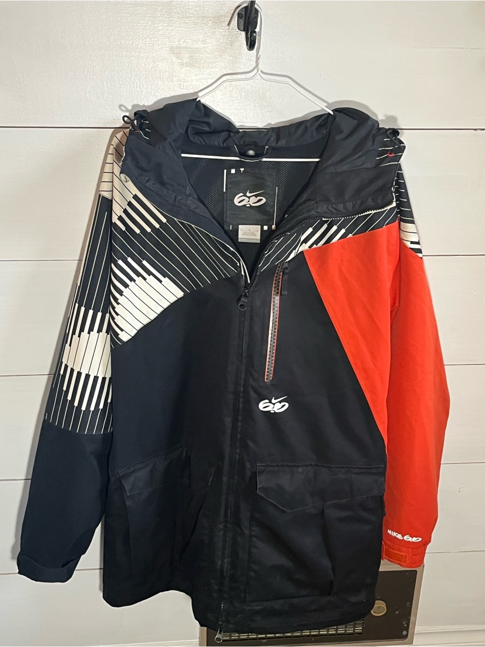 Nike 6.0 Men's Black, Orange & White Ski Jacket with Graphic Panels